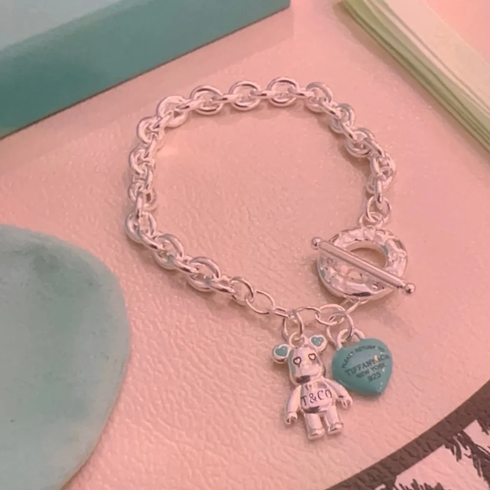 Tiffany & Co. Silver Charm Bracelet with Blue Heart and Bear
